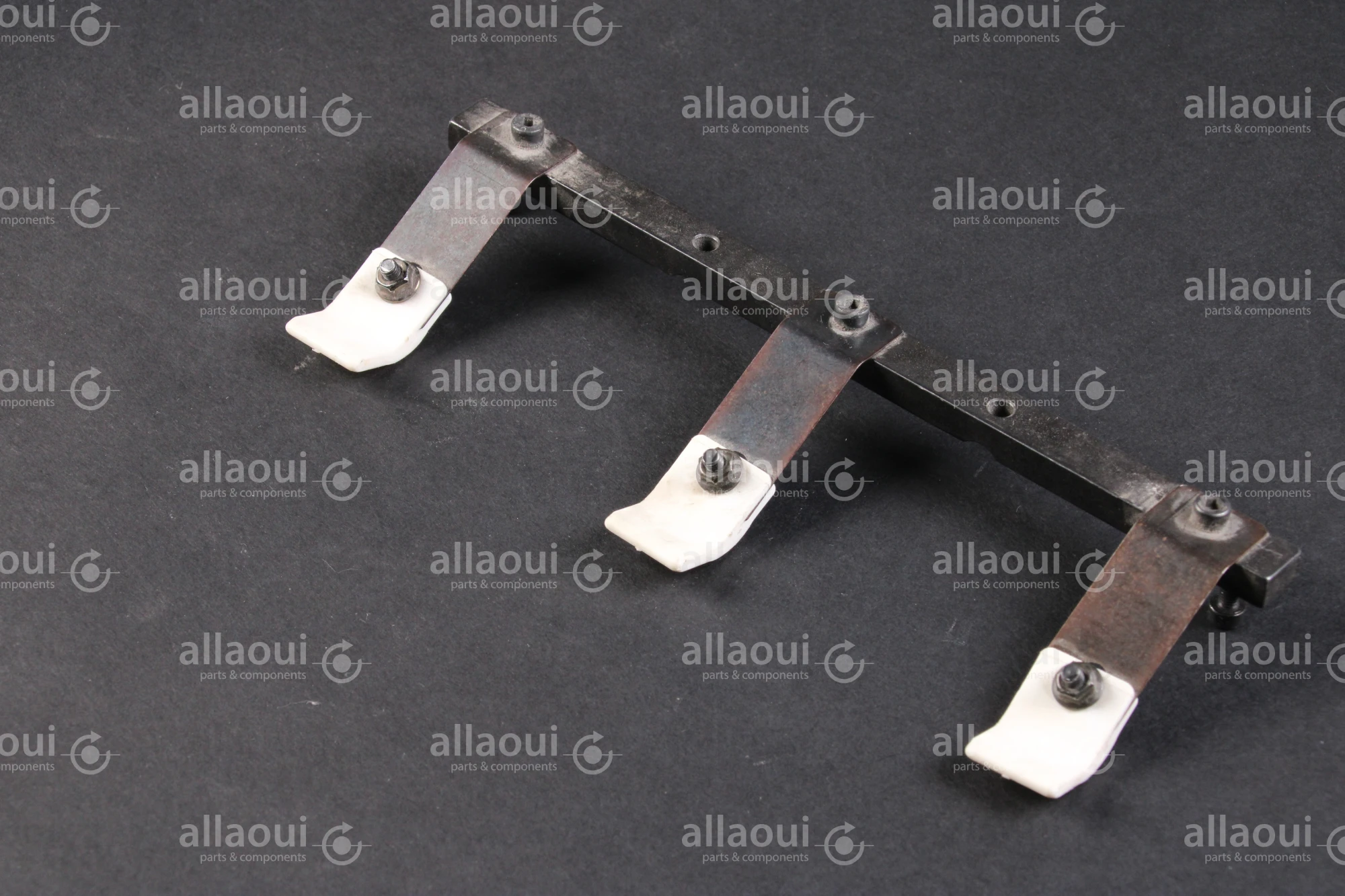 Müller Martini Support bar + vibrator part of stapler feeder 0316.3202.3 Müller Martini Support bar + vibrator part of stapler feeder 0316.3202.3